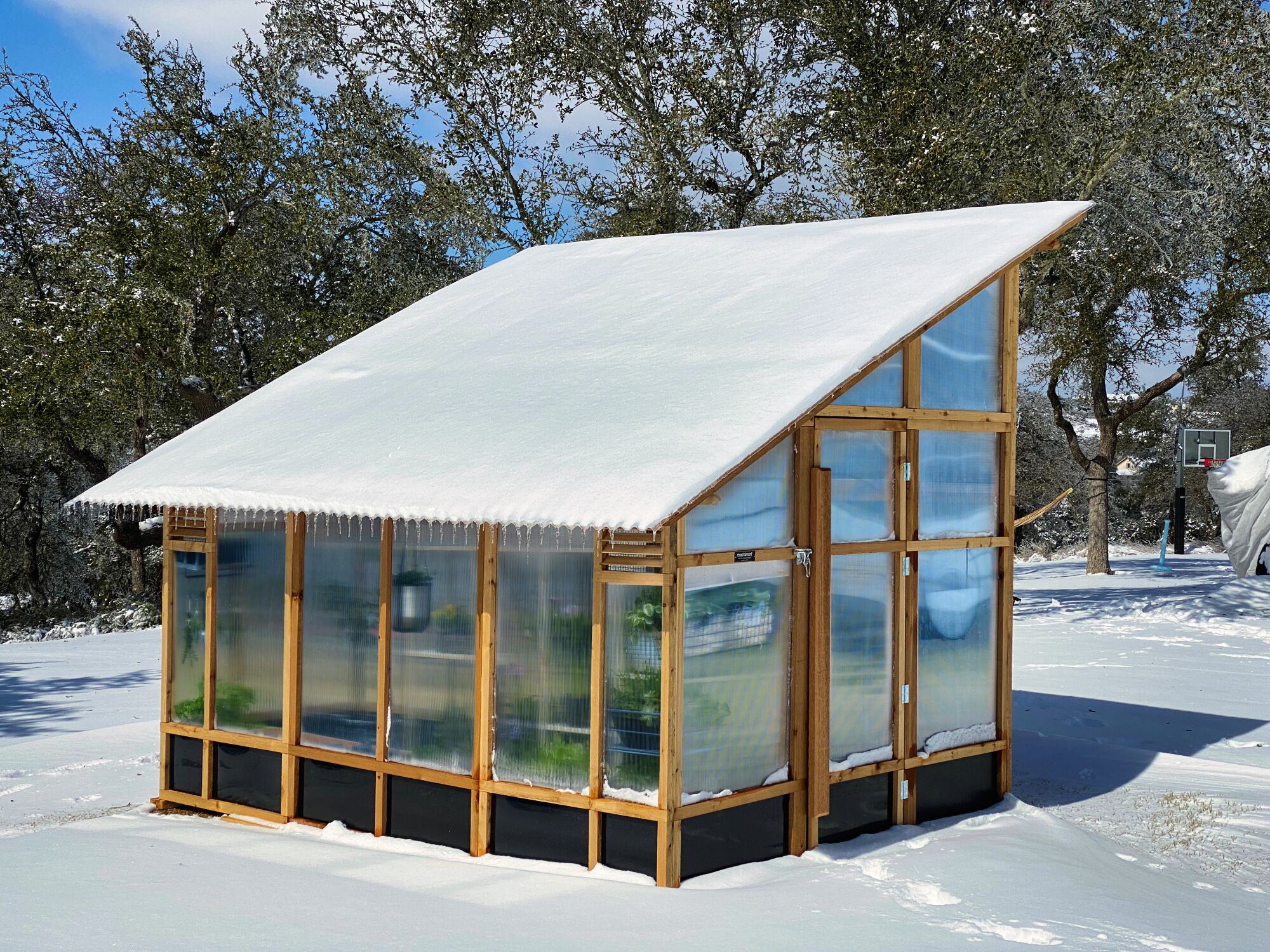 Slant-Roof Greenhouse in the Snow