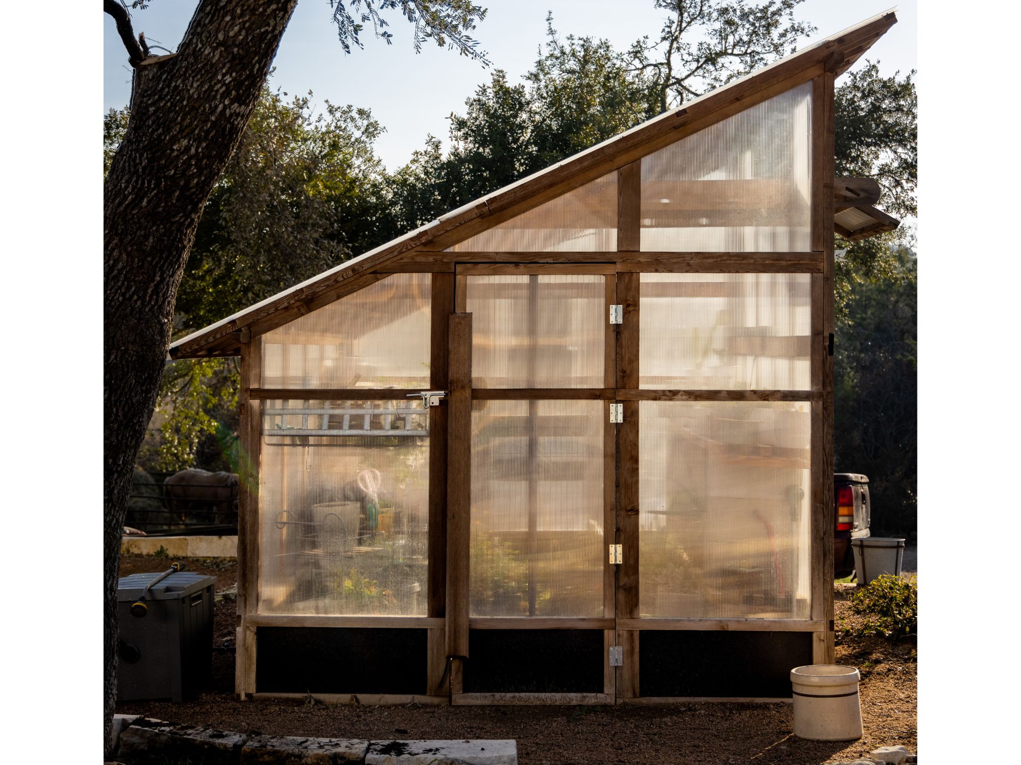 Roost-Root-Slant-Roof-Greenhouse-Evening